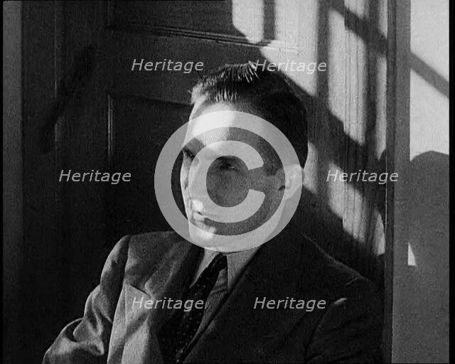 Bruno Richard Hauptmann Leaving the Courtroom After the Verdict in the Lindbergh's..., 1930s. Creator: British Pathe Ltd.