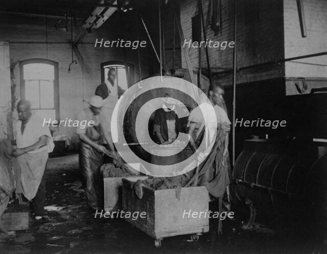 African American workers doing laundry at the Bureau of Engraving & Printing, c1895. Creator: Frances Benjamin Johnston.