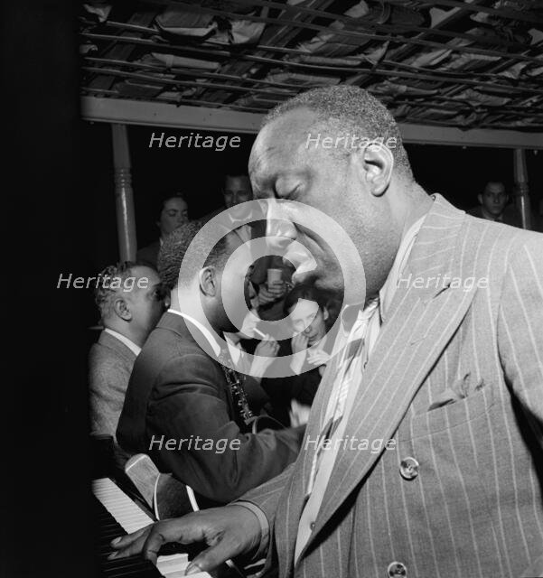 Portrait of James P. (James Price) Johnson, Riverboat on the Hudson, N.Y., ca. July 1947. Creator: William Paul Gottlieb.