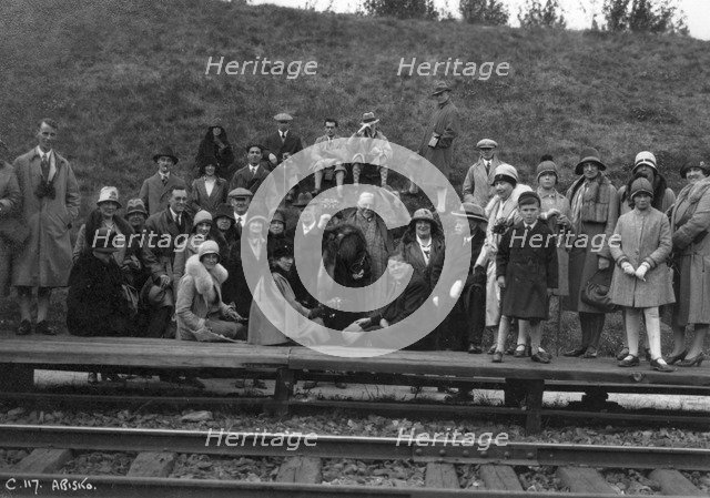 Group of tourists on a railway platform, Abisko, northern Sweden, 1929. Artist: Unknown
