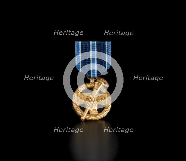 NASA Outstanding Leadership Medal awarded to Sally Ride, 1987. Creator: Unknown.