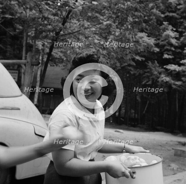 Miss Sumi Yumaguchi, Japanese dietican, Camp Ellen Marvin, Arden, New York, 1943. Creator: Gordon Parks.