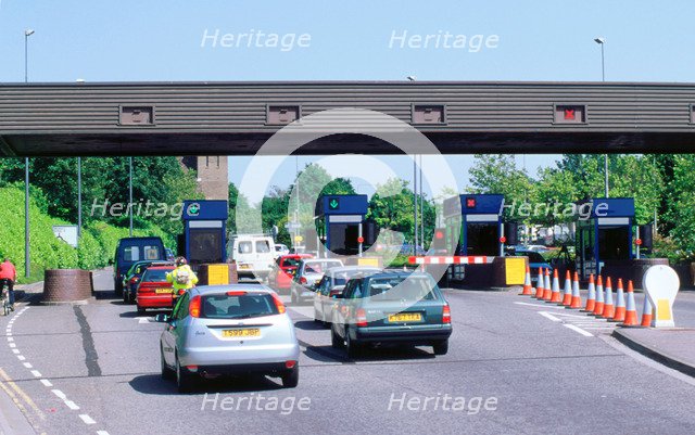 Traffic at toll booths on Itchen Bridge, Southampton. Artist: Unknown.