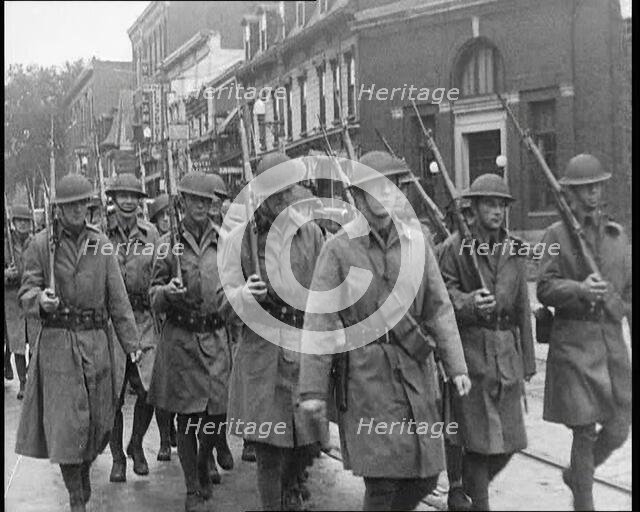 US Army Troops With Guns Marching, 1932. Creator: British Pathe Ltd.