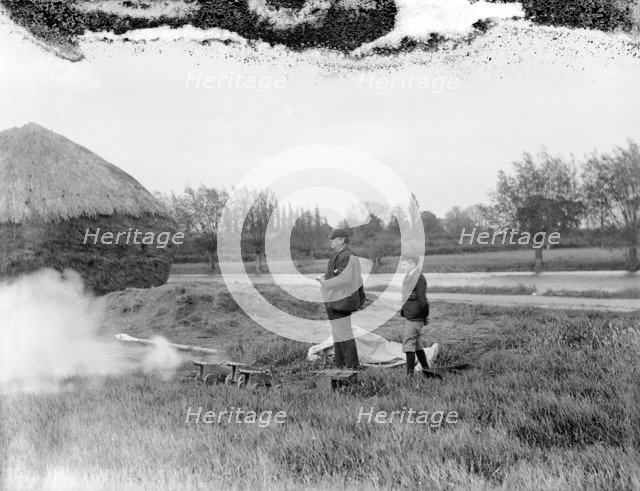 Tims the Timekeeper and starter, starting off a race during Eights Week, Oxford, c1860-c1922. Artist: Henry Taunt