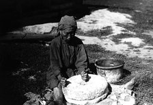 Working with a flour millstone, 1890. Creator: Unknown.