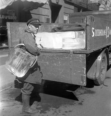 Iceman busy during the heatwave in Stockholm, Sweden, 24th July 1943. Artist: Karl Sandels