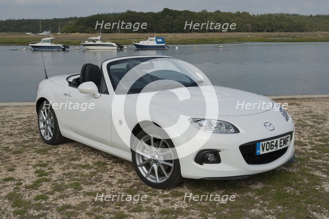 2014 Mazda MX5 Roadster Coupe Artist: Unknown.