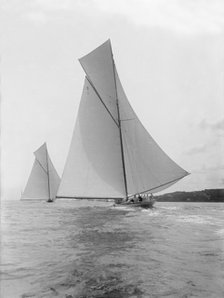 The majestic cutters 'White Heather' and 'Shamrock' race downwind, 1912. Creator: Kirk & Sons of Cowes.
