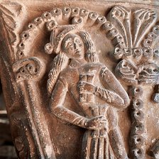 Lady Troubadour, capital of the cloister of Santa Maria de l'Estany.