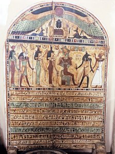 Funerary stela representing the deceased accompanied by Anubis in the presence of Osiris and Horu…