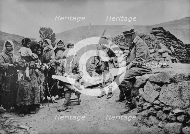 Yarrow allotting relief to Armenian orphans, between c1915 and c1920. Creator: Bain News Service.