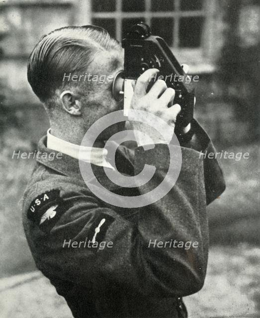 Airman learning navigation during the Second World War, 1941. Creator: Charles Brown.