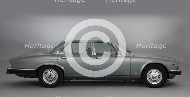 1987 Jaguar XJ12 Sovereign Artist: Unknown.