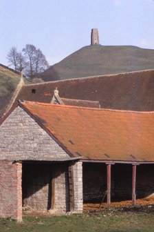 GlastonburyTor and ancient Tithebarn in foreground, Somerset, 20th century. Artist: CM Dixon.