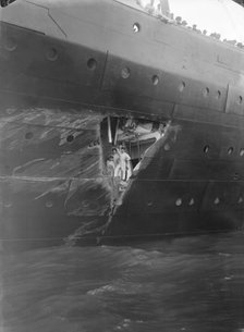 Hole torn in the hull of 'RMS Olympic' after the collision with 'HMS Hawke' in the Solent, 1911. Creator: Kirk & Sons of Cowes.