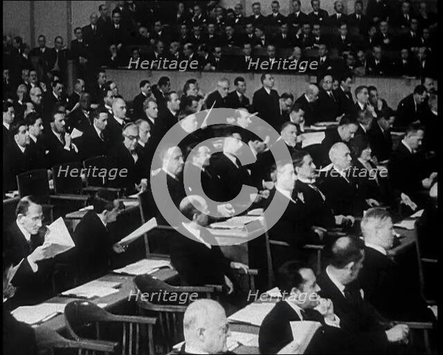Men Sitting in a Meeting at the League of Nations, 1933. Creator: British Pathe Ltd.