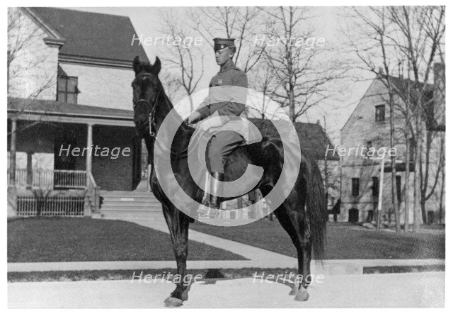 George S Patton, American soldier, on horseback, Fort Sheridan, Illinois, USA, 1910. Artist: Unknown
