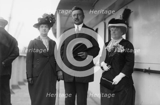 Mrs. R.A.C. Smith, Mr. R.A.C.Smith, and Mrs. J.F. Day, between c1910 and c1915. Creator: Bain News Service.