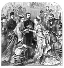 Arrival of the Duke and Duchess of Edinburgh at Gravesend:...presenting a bouquet to the bride, 1874 Creator: Unknown.