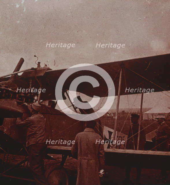 Checking aircraft with the pilot, 1916. Artist: Unknown.