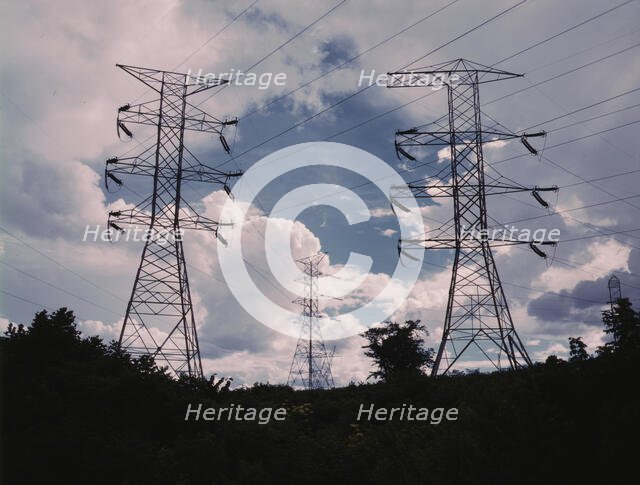 Transmission line towers and high tension lines that......Wilson Dam..., near Sheffield, Ala., 1942. Creator: Alfred T Palmer.