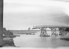 Bridge partially extended over a body of water, Japan, 1908. Creator: Arnold Genthe.
