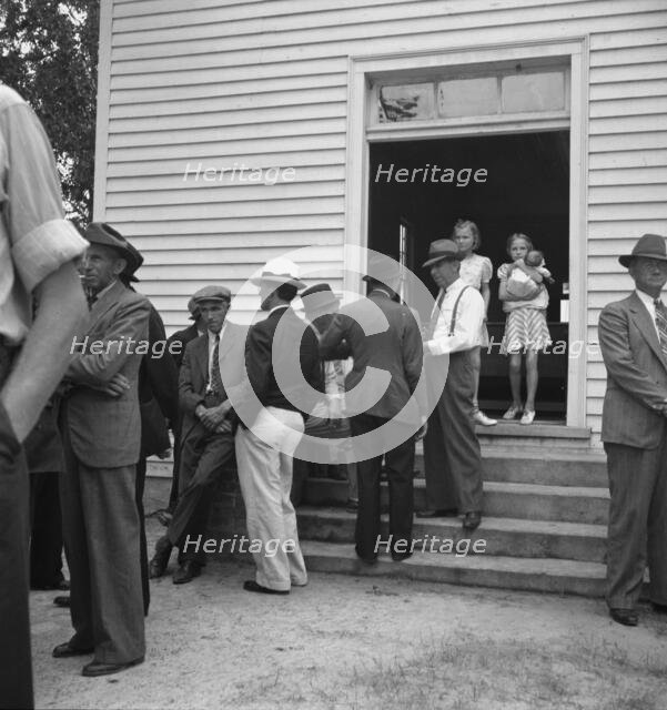 Possibly: Congregation entering church, Wheeley's Church, Person County, North Carolina, 1939. Creator: Dorothea Lange.