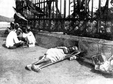 Scenes in Plague-Stricken Bombay: a wayside case, 1898. Creator: Gysi.