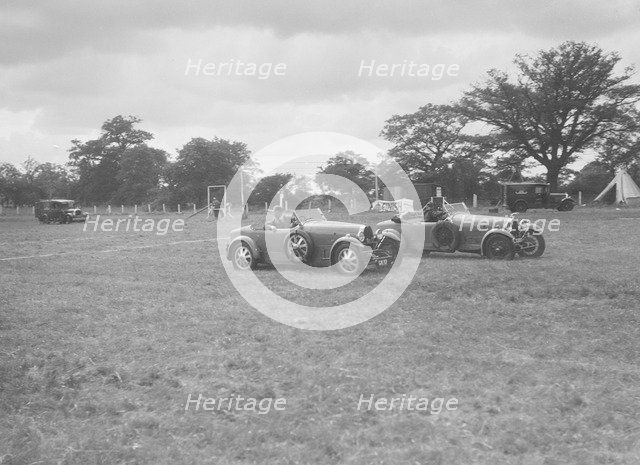 Bugatti Type 43 and Type 44 taking part in the Bugatti Owners Club gymkhana, 5 July 1931. Artist: Bill Brunell.