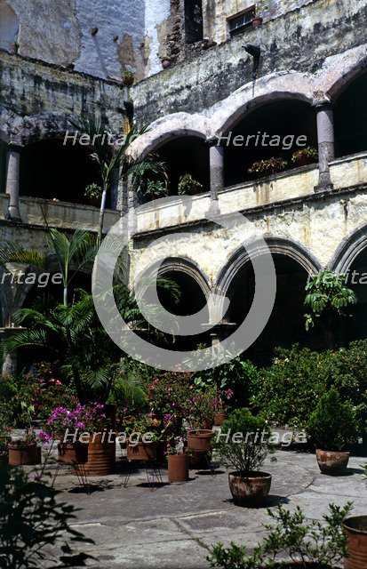 Cloister of the former Franciscan convent which is part of the present Cathedral of Cuernavaca, i…