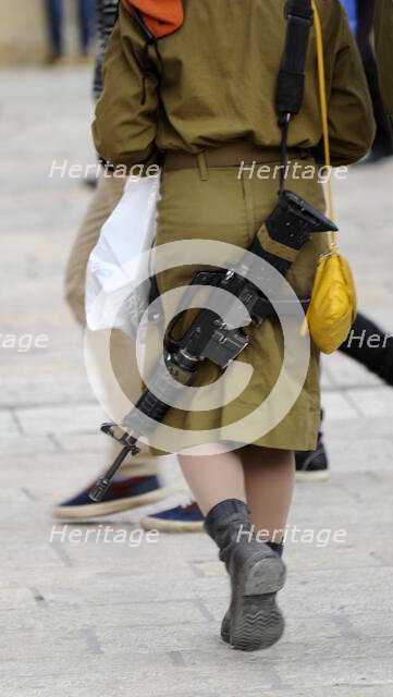 Israeli female soldier at Western Wall, Israel, Jerusalem, 2013.  Creator: LTL.