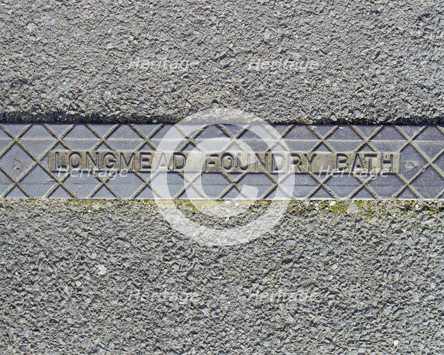 Pavement rainwater gully cover plate made by Longmead Foundry, Bath, Swindon, Wiltshire, 2006. Artist: Peter Williams.