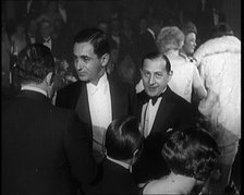 Composer Irving Berlin Talking to Two Male Civilians, 1924. Creator: British Pathe Ltd.