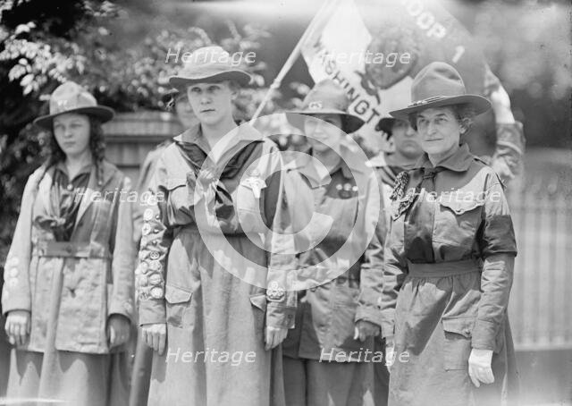 Girl Scouts - Troop #1. Mrs. Juliette Low, Founder, Right; Elenore Putsske, Center; Evaline..., 1917 Creator: Harris & Ewing.