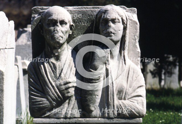 Husband and wife on Roman gravestone. Artist: Unknown.