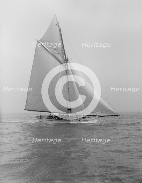 The cutter 'Grisette' sailing close-hauled, 1913. Creator: Kirk & Sons of Cowes.
