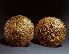 Pair of gold brooches.