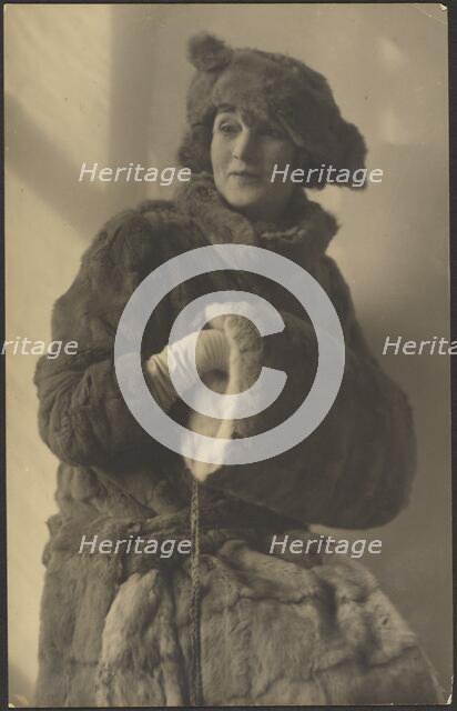 Portrait of a Woman in Furs with Muff, 1907-1943. Creator: Louis Fleckenstein.
