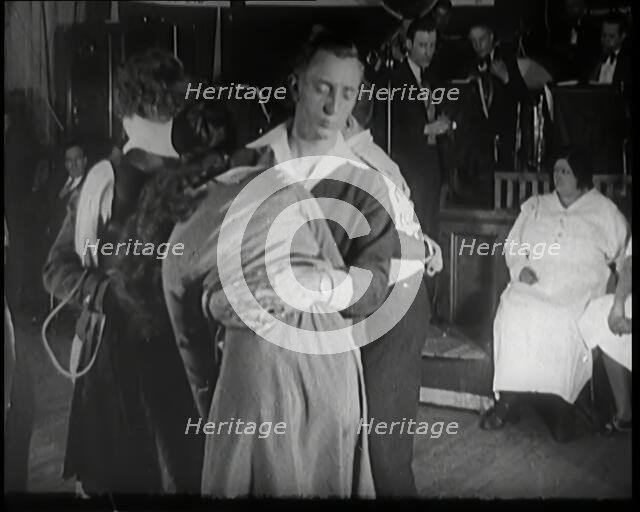 Couples Dancing Whilst Half Asleep in a Marathon Dance Contest, 1926. Creator: British Pathe Ltd.