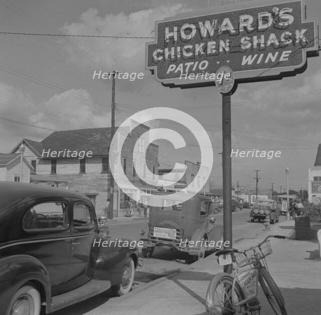 Street scene, Daytona Beach, Florida, 1943. Creator: Gordon Parks.