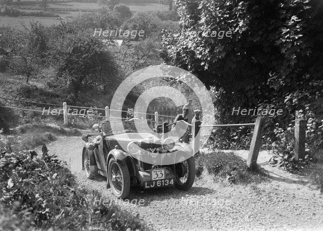 1932 MG J1 taking part in a West Hants Light Car Club Trial, Ibberton Hill, Dorset, 1930s. Artist: Bill Brunell.