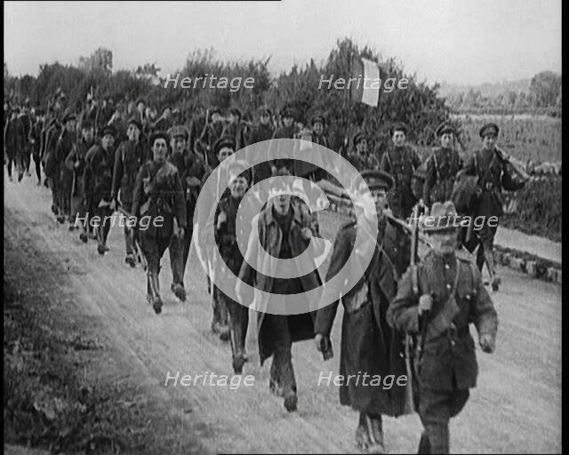 Irish Free State Soldiers Marching Along a Road, 1922. Creator: British Pathe Ltd.