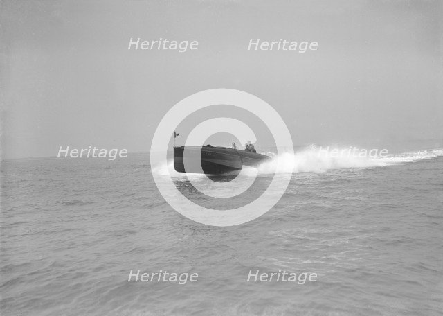 The power boat 'Maple-Leaf III' under way, 1911. Creator: Kirk & Sons of Cowes.