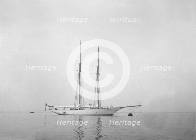 Schooner at anchor. Creator: Kirk & Sons of Cowes.