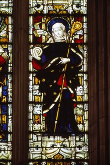 St. Hilda of Whitby holding an ammonite, West window, Hereford Cathedral, 20th century. Artist: CM Dixon.