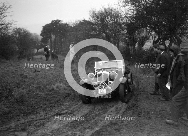 Wolseley Hornet of AK Hunt at the Sunbac Colmore Trial, near Winchcombe, Gloucestershire, 1934. Artist: Bill Brunell.