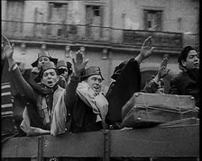 Spanish Fighters on the Back of a Lorry Making Fascist Salutes and Celebrating the Victory..., 1939. Creator: British Pathe Ltd.