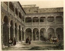 Courtyard of the archbishop Palace of Alcalá de Henares, with scene of life and traditional costu…