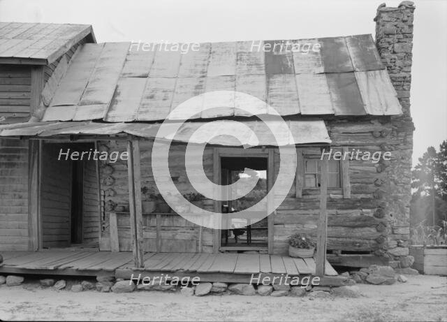 Negro sharecropper house on dirt, near Olive Hill, North Carolina, 1939. Creator: Dorothea Lange.